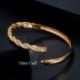 Fém színe: sárga arany - CWWZircons Twist Lines Cubic Zirconia Dubai Rose Gold színű nyitott mandzsetta menyasszonyi