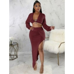 Szín: bordó XL - Gyönyörű női 2 darab kétrészes öltöny, mély V nyakú, hosszú ujjú, vágásos felsők és oldalt
