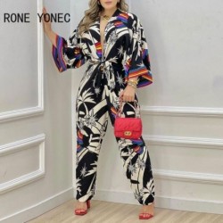 Szín: MULTI S - Elegáns női, háromnegyedes ujjú, mély V nyakú, végig nyomtatott, egyenes lábú, alkalmi jumpsuit